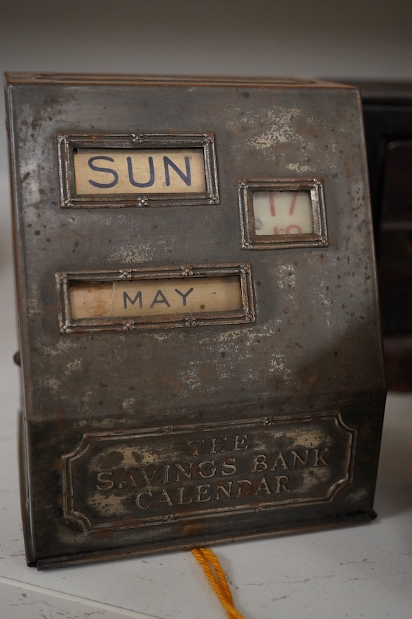 Six various metalware money boxes to include a ‘cannonball’ money box, a ‘safe’ money box, a George V ‘Royal Bank’ money box etc. 19th century and later. Condition - fair